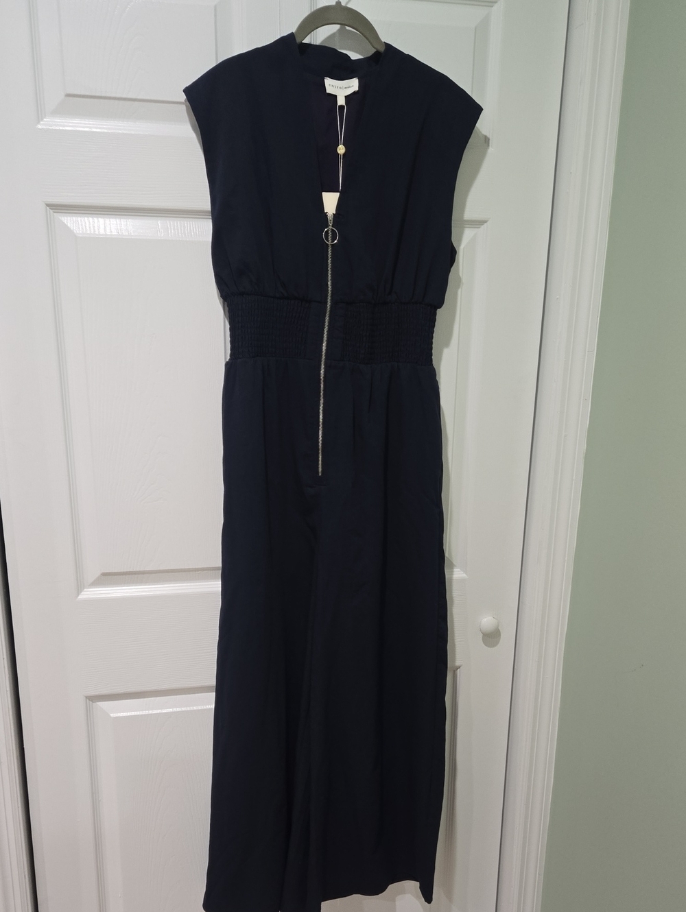 entro Navy Sleeveless Jumpsuit with Smocked Waist and Ring Zip